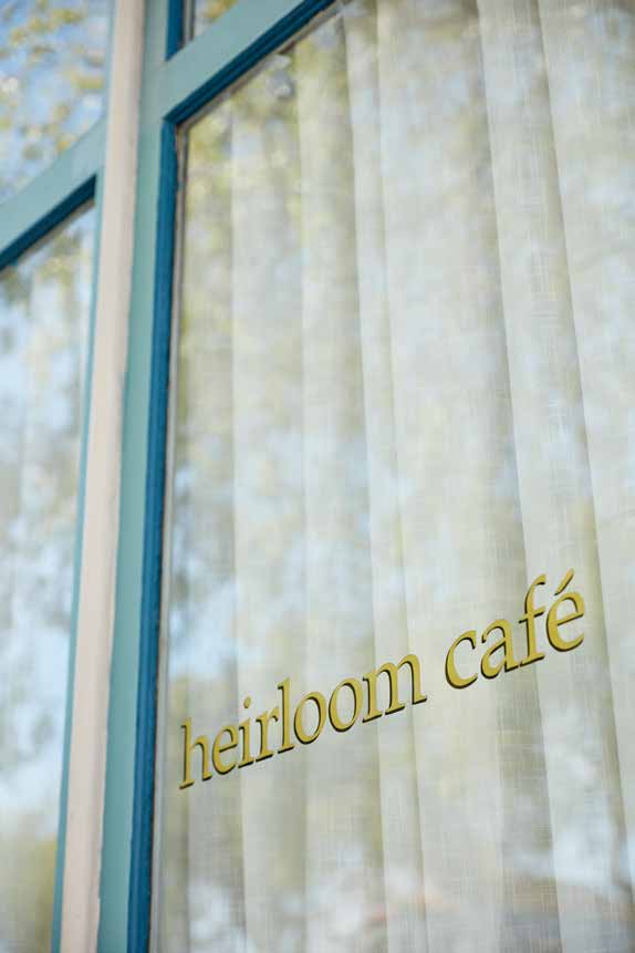 Heirloom Cafe storefront with gold lettering